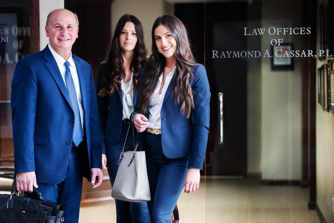 Attorney Raymond Cassar with team